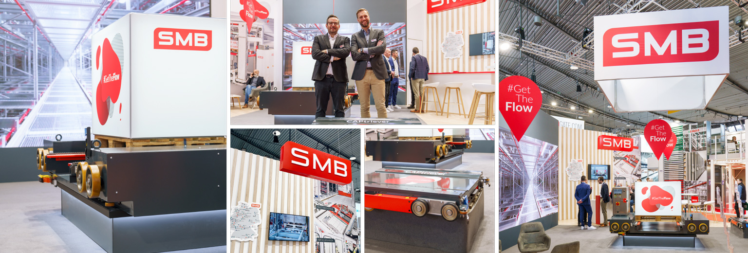 Messestand der Firma SMB mit roten Logos und dem Slogan „#GetTheFlow“, technischen Fördermodulen, Präsentationen und Besuchern in einem hellen Ausstellungsbereich.